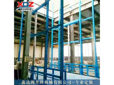 导轨式液压升降平台：多层仓储仓库装卸专用设备